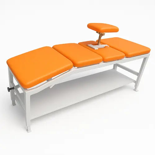 Massage table with orange cushions on a white background
