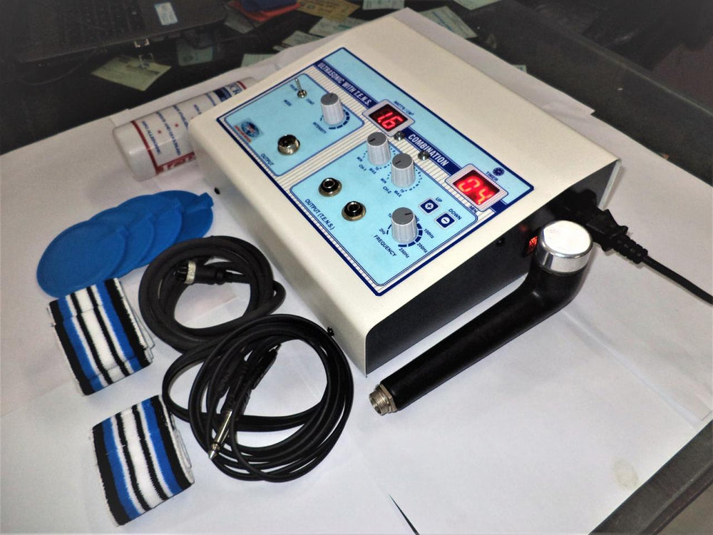 Medical device with control panel and attachments on a white surface