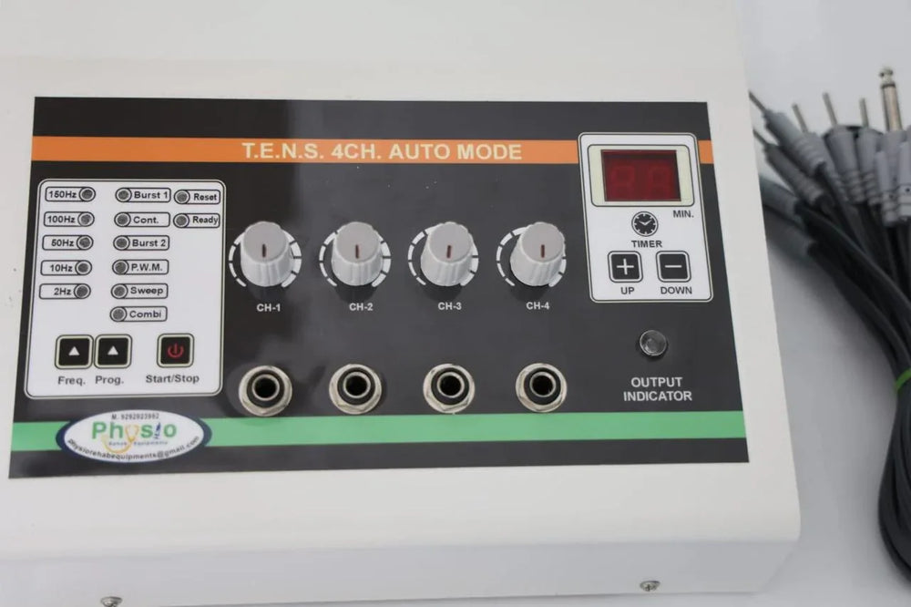 TENS machine with control panel and cables on a white background