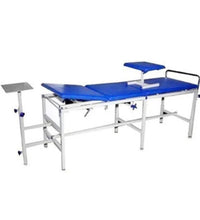 Medical examination table with blue surface and metal frame on a white background